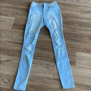 Fashion Nova destroyed denim jeans
